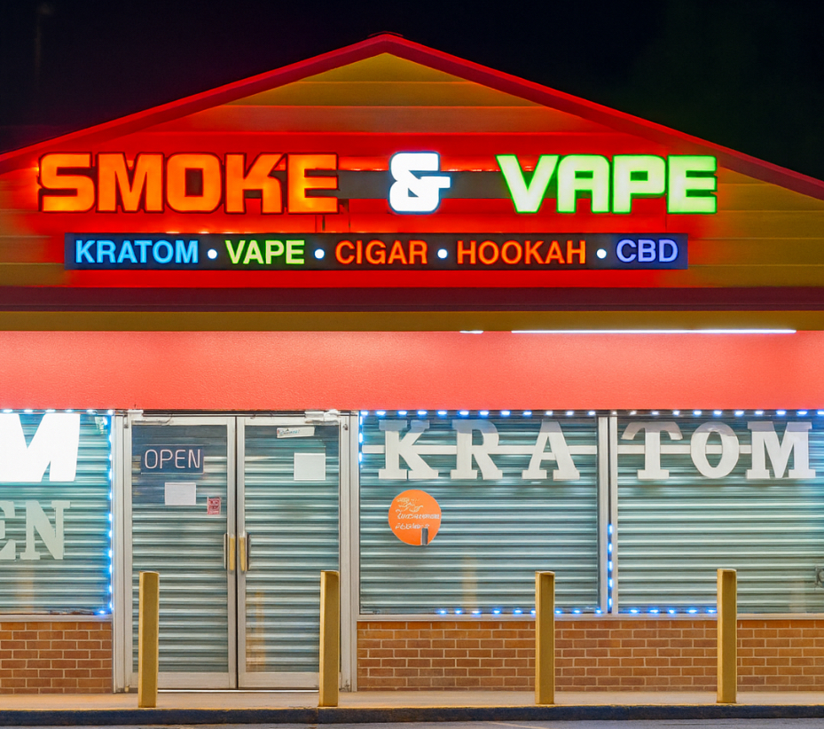 Smoke and vape shop storefront selling Kratom, vape, cigar, and CBD products